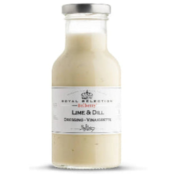 Bottle of lime and dill dressing with a white label on a light beige background
